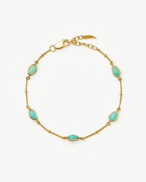 MAGMA GEMSTONE CHARM BRACELET / GOLD