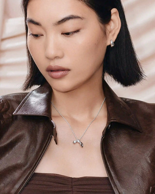 MARK GONG BOW PENDANT NECKLACE / SILVER