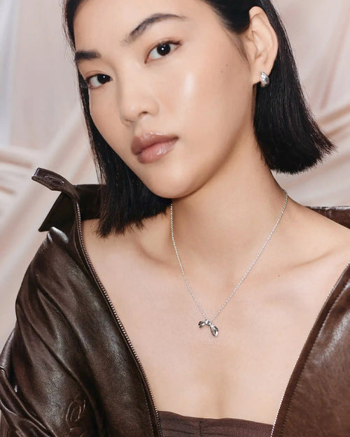 MARK GONG BOW PENDANT NECKLACE / SILVER