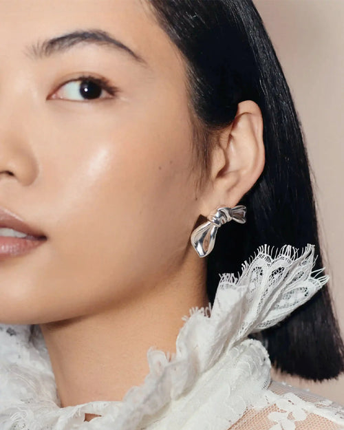 MARK GONG BOW OVERSIZED STUD EARRINGS / SILVER