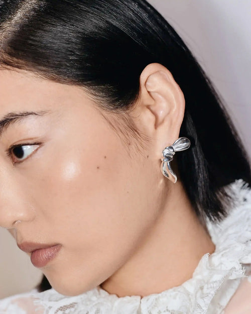 MARK GONG BOW OVERSIZED STUD EARRINGS / SILVER