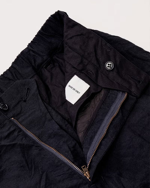 TUMBLE WASHED PEGTOP PANTS / NAVY