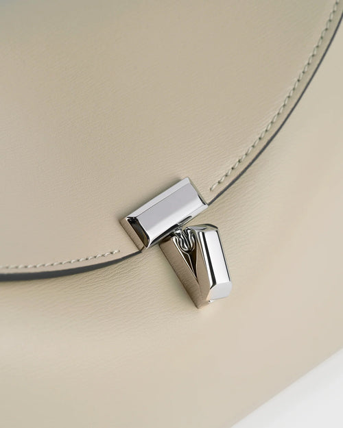 T-LOCK LEATHER CLUTCH / FAWN